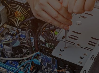 Engineer working inside a computer