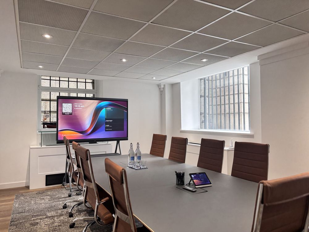 MFB Solicitors meeting room at Fishmongers’ Hall with a display and leather chairs