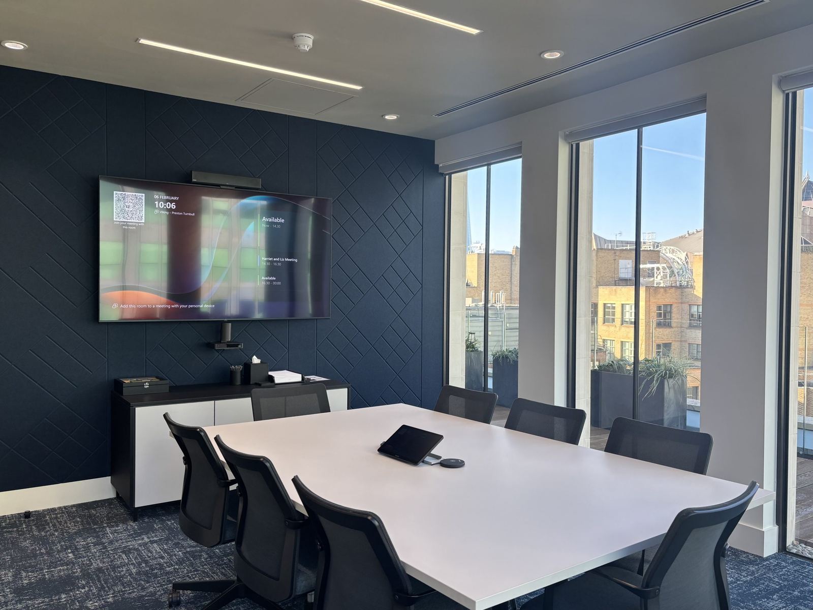 Preston Turnbull meeting room with a display on a dark feature wall